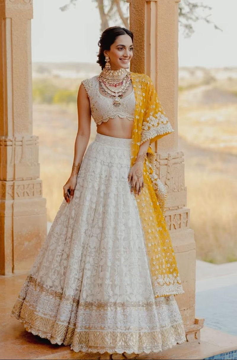 Bride: Kiara Advani in our Ivory Threadwork with Gold Borders Lehenga –  Manish Malhotra