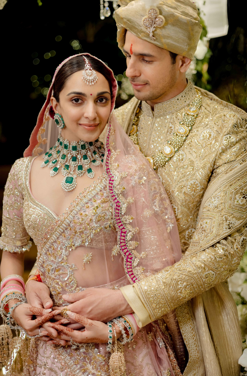 Bride: Kiara & Groom: Sidharth in our Bespoke Ensemble for Wedding