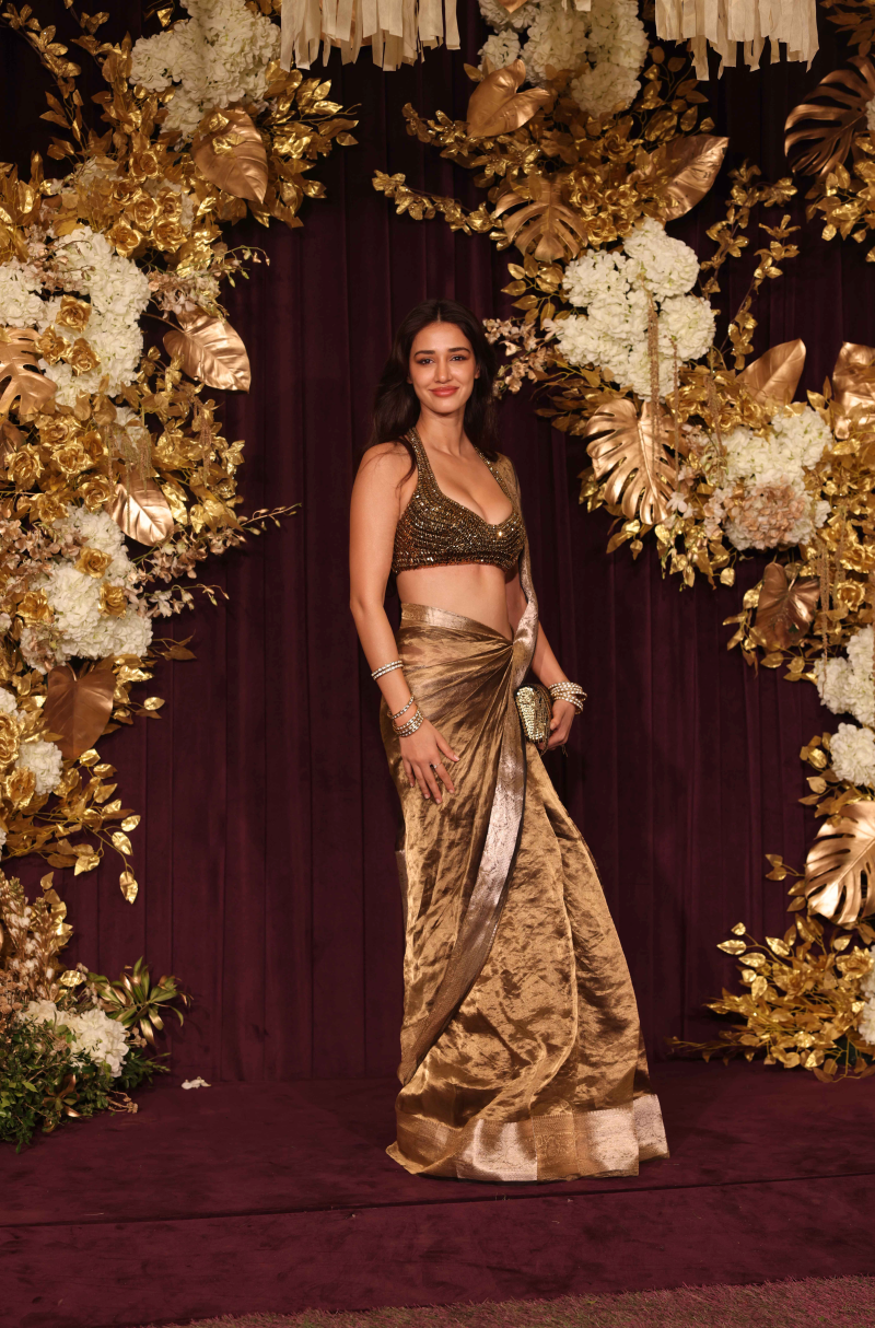 Disha Patni in our Gold tissue Stitched Saree Set – Manish Malhotra