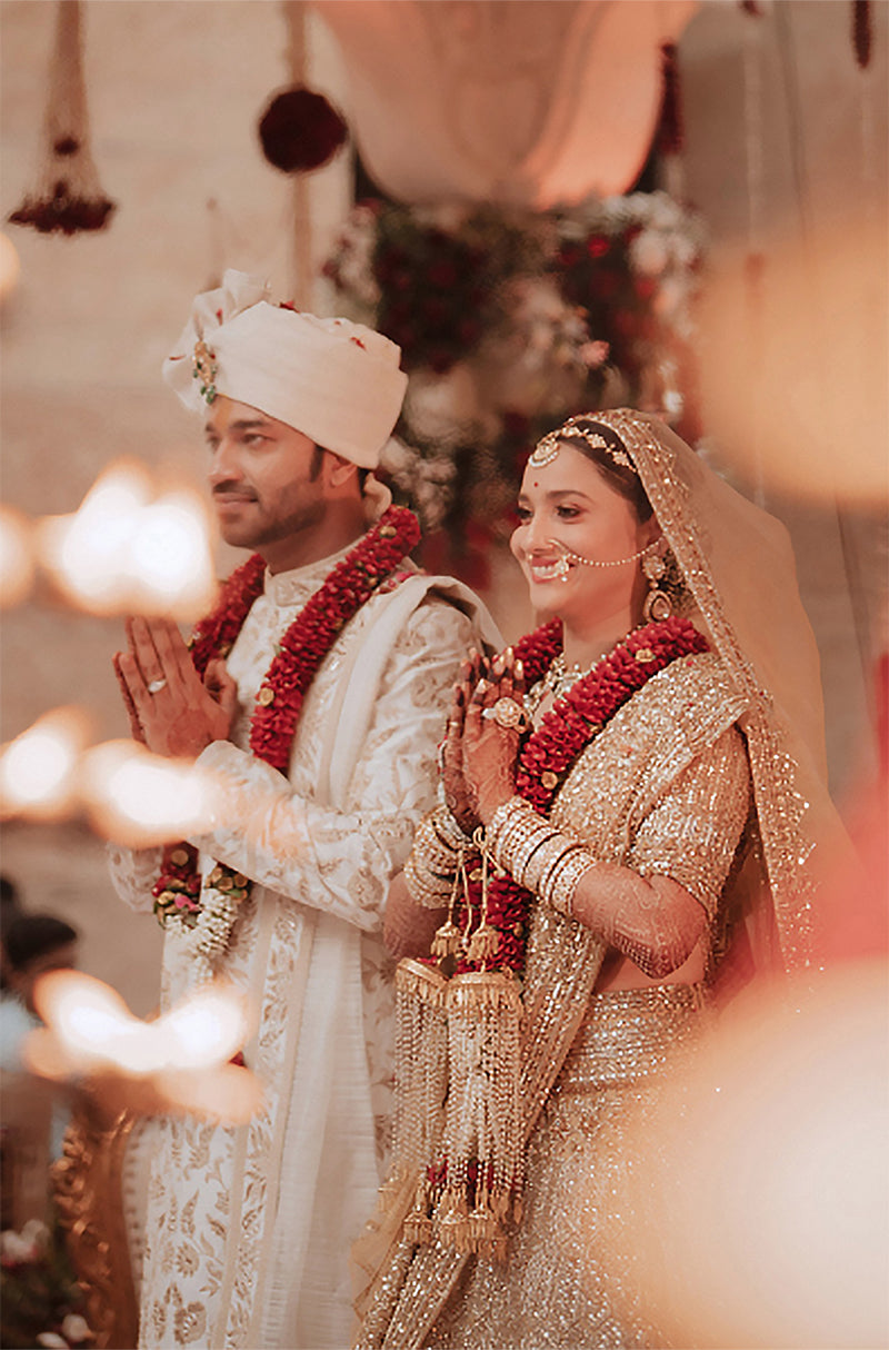Bride: Ankita Lokhande & Groom: Vicky Jain in our Customize Ensemble