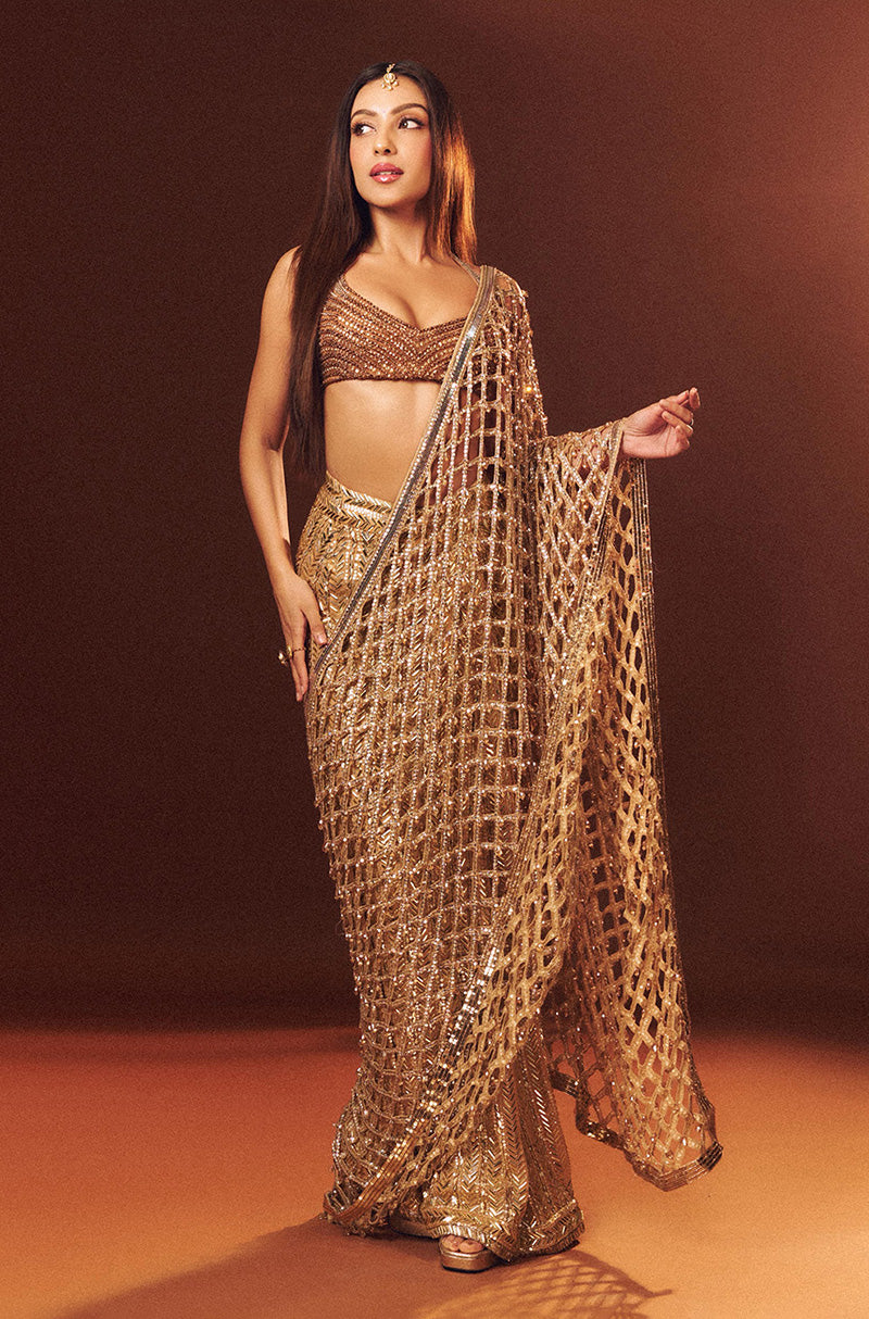 Sahher Bambba in our Gold Taban Half & Half Stitched Saree