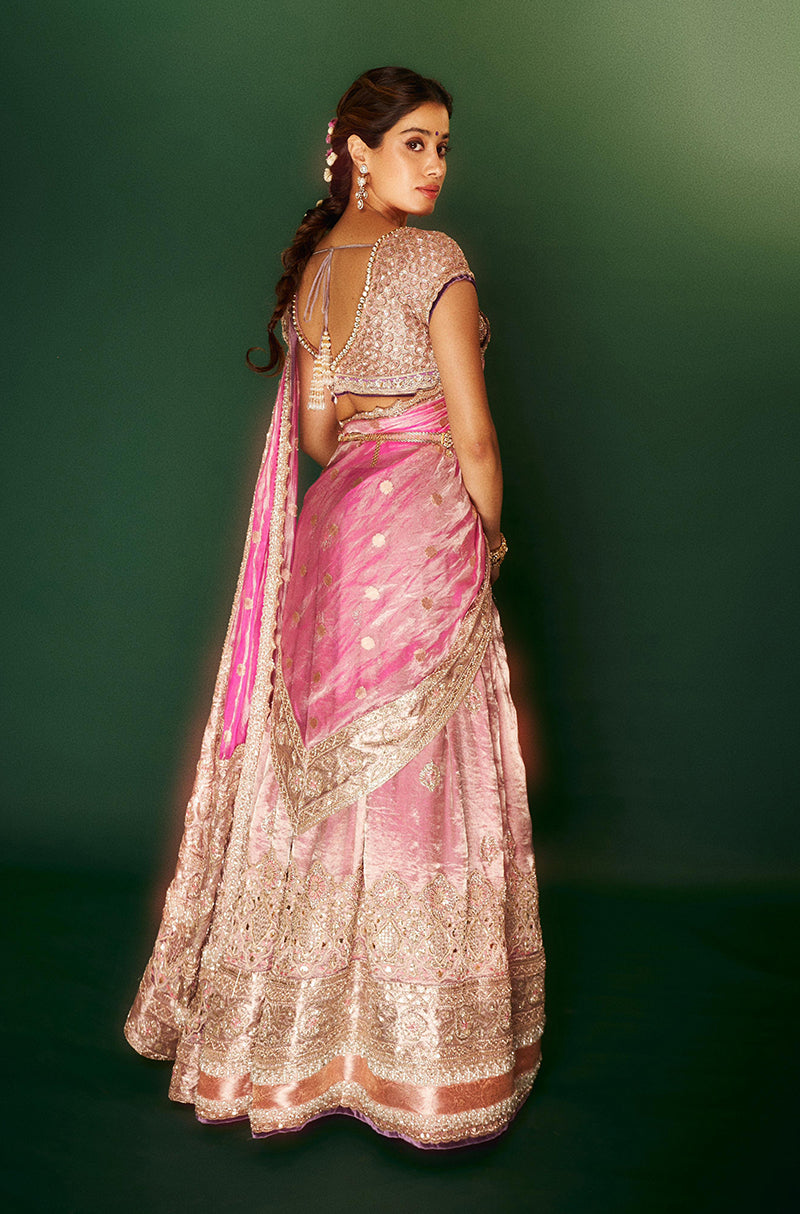 Janhvi Kapoor in our Dusty Rose Pink Tissue Pattu Pavda Lehenga Set