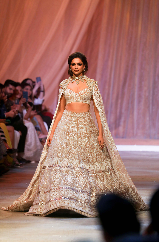 Deepika Padukone in our Beige Mijwan Embroidered Lehenga Set