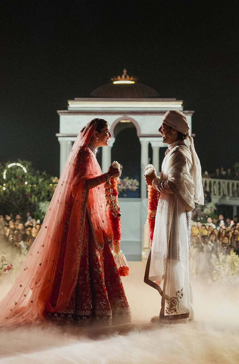 Bride: Nupur Sanon & Groom Stebin Ben in our Bespoke Ensemble