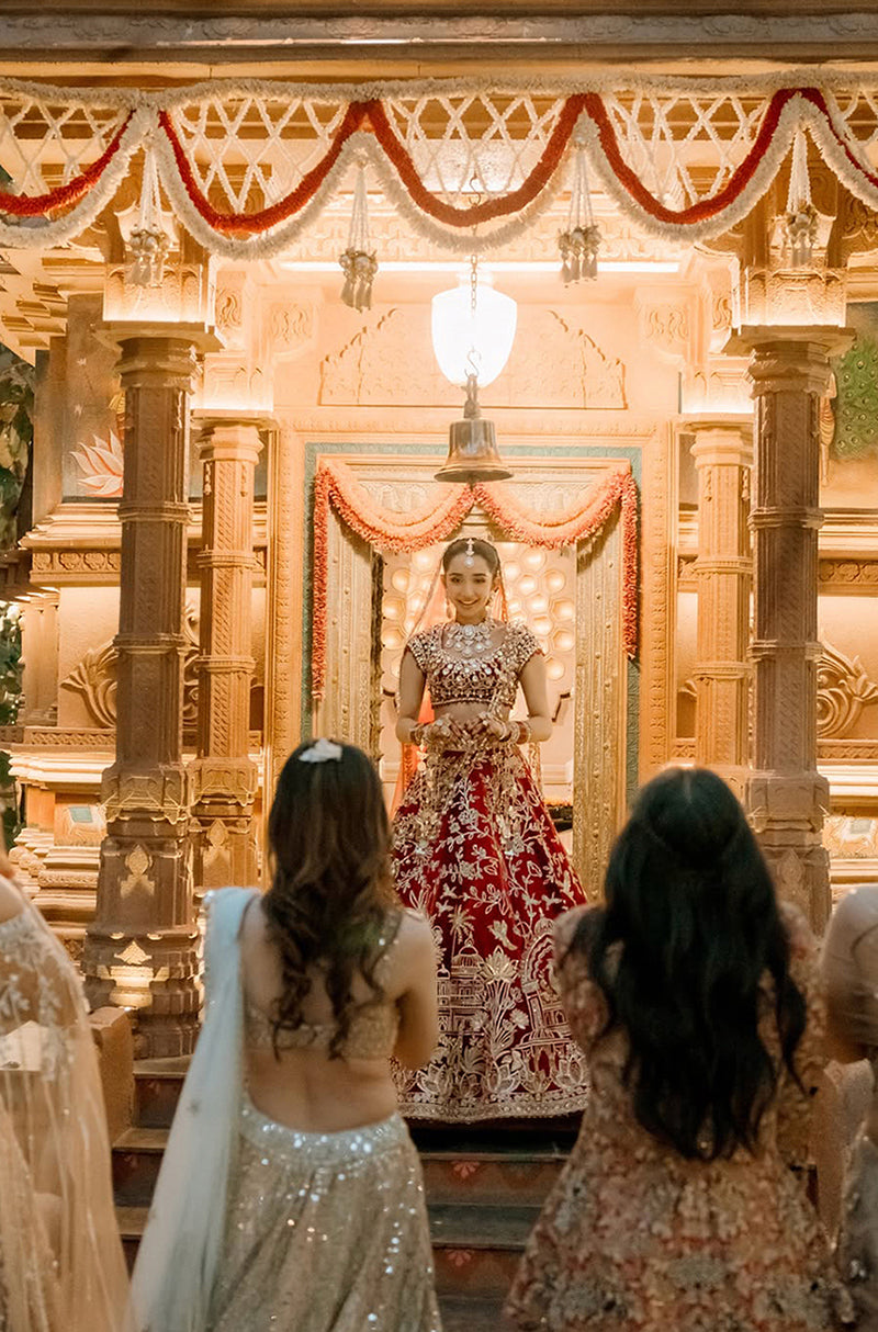 Bride: Ahana Raheja in our Red Multi-Motif Embroidered Lehenga Set