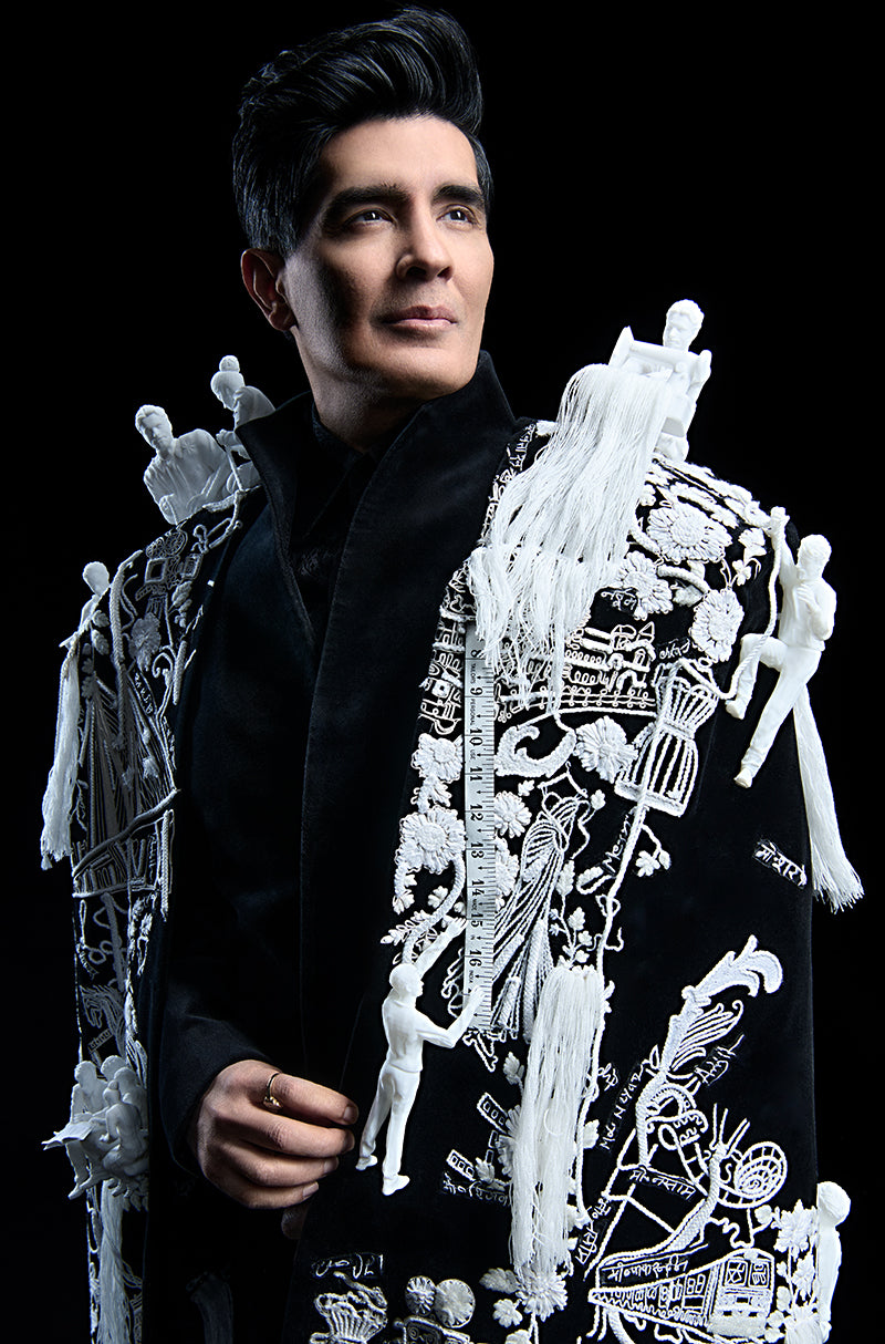 MM our Founder & Creative Director in Bandhgala Layered with an Architectural Cape