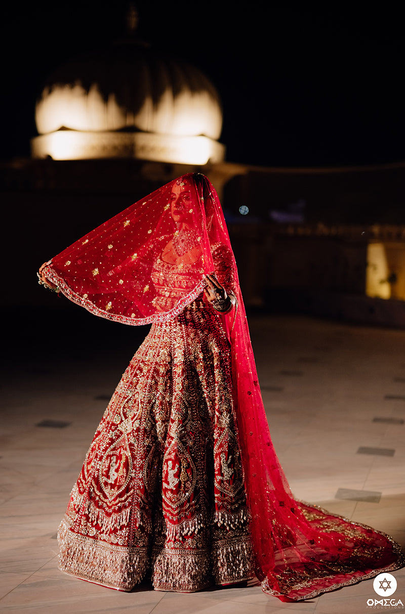 Bride: Nayasa Manchanda in our Bespoke Red Embroidered Lehenga Set