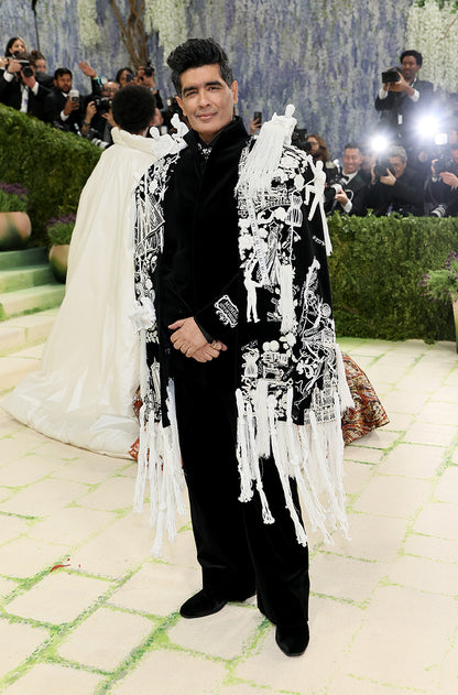 MM our Founder & Creative Director in Bandhgala Layered with an Architectural Cape