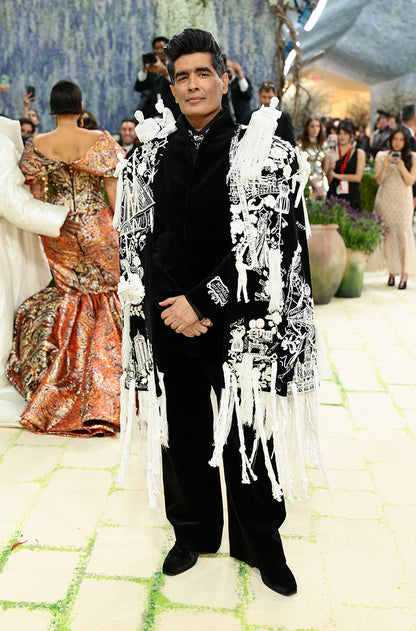 MM our Founder & Creative Director in Bandhgala Layered with an Architectural Cape