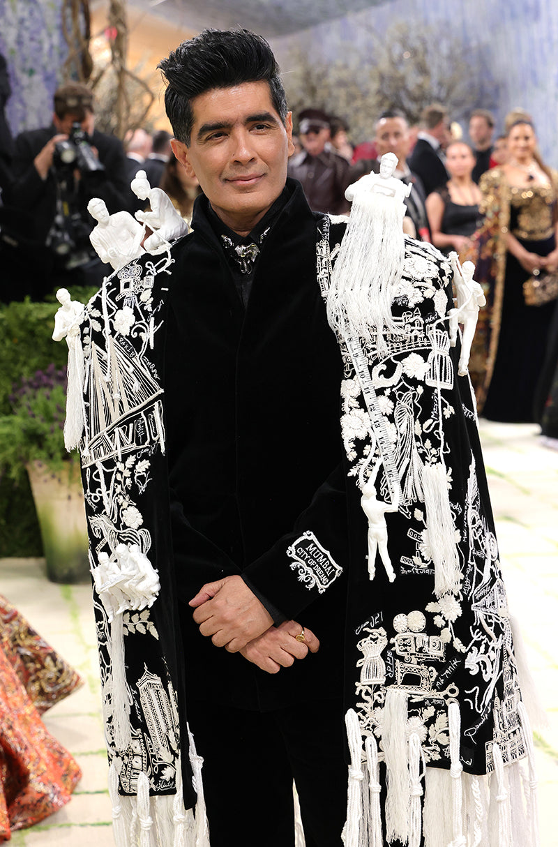 MM our Founder & Creative Director in Bandhgala Layered with an Architectural Cape