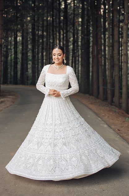 Bride: Jasman Dhaliwal in our Ivory Embroidered Lehenga Set