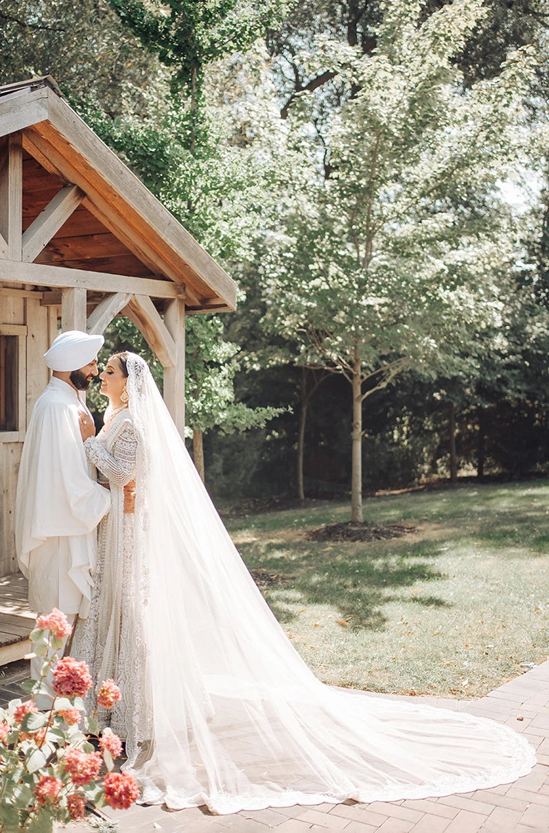 Bride: Jasman Dhaliwal in our Ivory Embroidered Lehenga Set