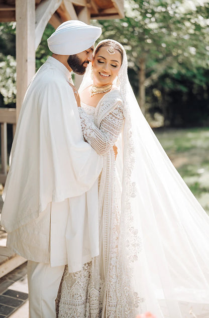 Bride: Jasman Dhaliwal in our Ivory Embroidered Lehenga Set