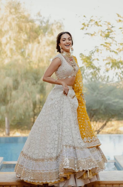 Bride: Kiara Advani in our Ivory Threadwork with Gold Borders Lehenga Set