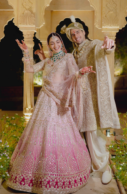 Bride: Kiara & Groom: Sidharth in our Bespoke Ensemble for Wedding