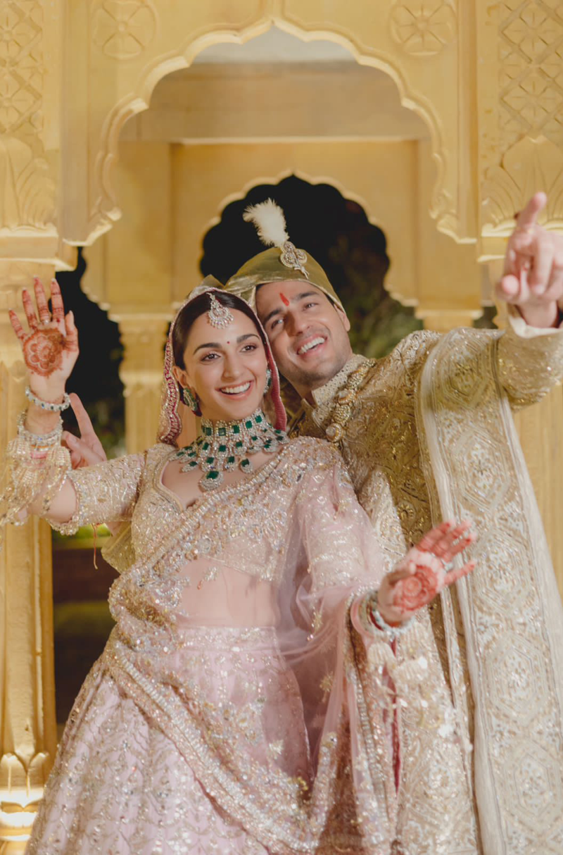 Bride: Kiara & Groom: Sidharth in our Bespoke Ensemble for Wedding
