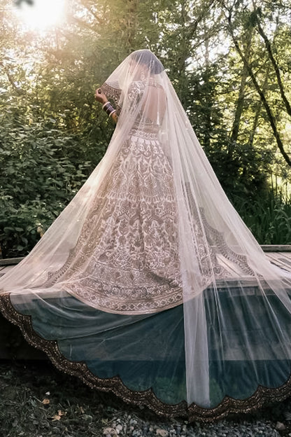 Bride: Suneet Mann & Groom: Arsh Thind in our Ivory and Antique Gold Nooraniyat Emsemble