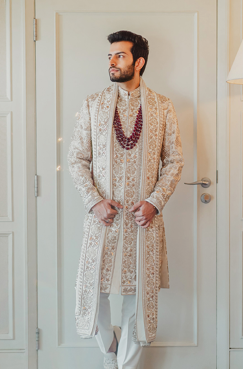 Bride: Vedika Karnani & Groom: Rishi Sujan in our Signature Embroidered Ensemble