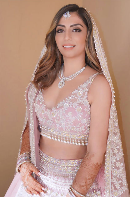 Bride: Neelam Gopwani Chainani in our Baby Pink Mijwan Embroidered Lehenga Set