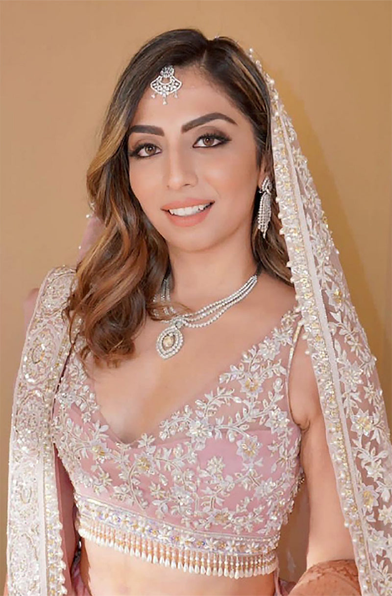 Bride: Neelam Gopwani Chainani in our Baby Pink Mijwan Embroidered Lehenga Set