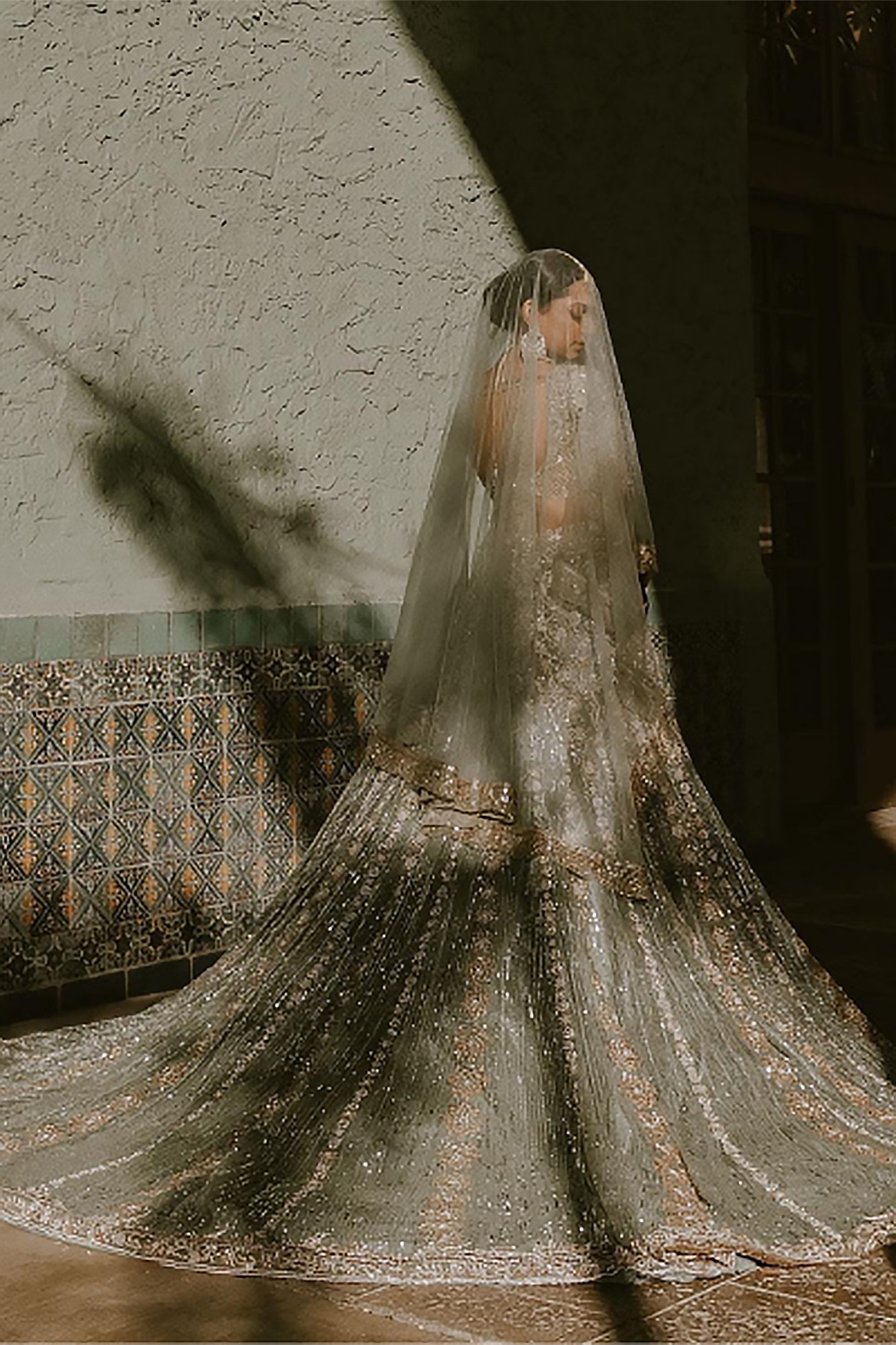 Bride: Sarika Patel in Moss Green Ruhaaniyat Lehenga Set