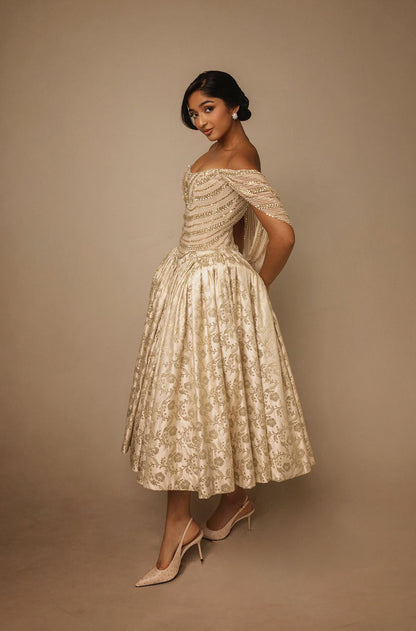 Maitreyi Ramakrishnan in our Archival Gold Brocade Tea-Length Skirt Set