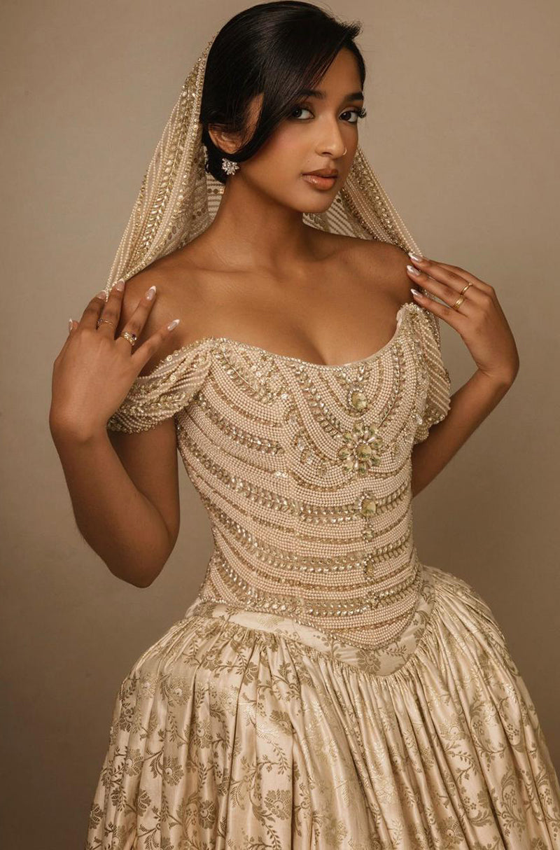 Maitreyi Ramakrishnan in our Archival Gold Brocade Tea-Length Skirt Set