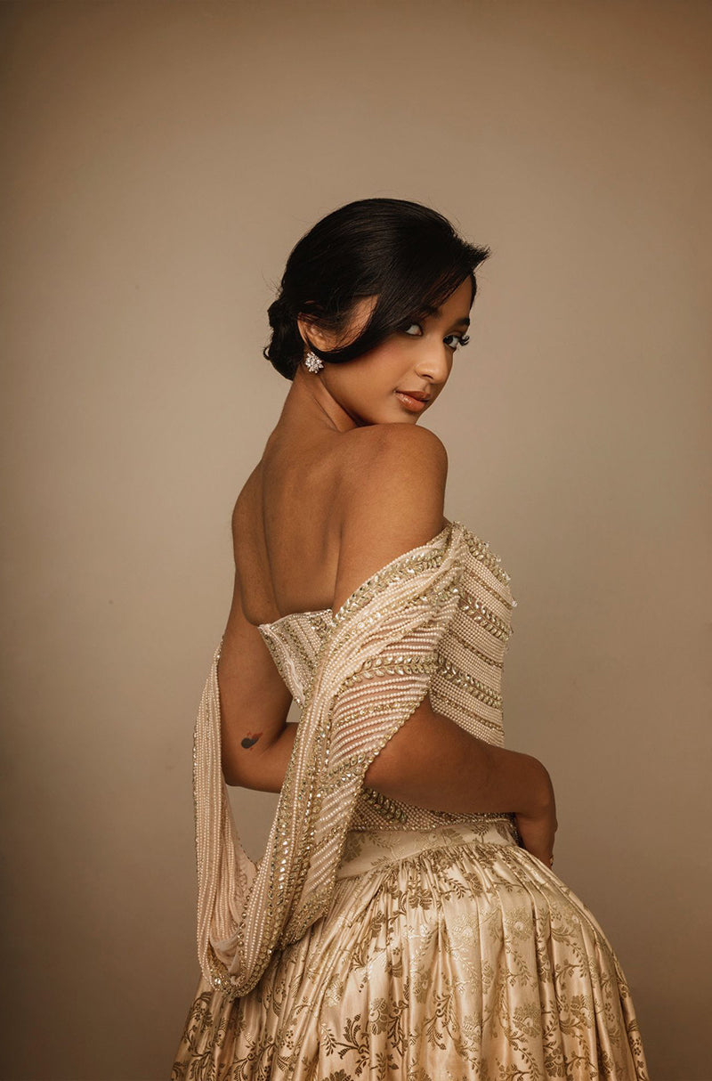 Maitreyi Ramakrishnan in our Archival Gold Brocade Tea-Length Skirt Set