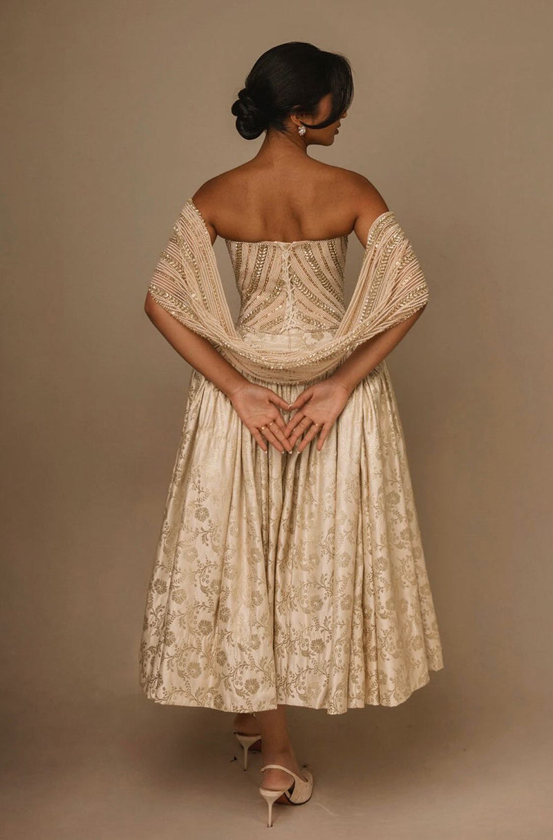 Maitreyi Ramakrishnan in our Archival Gold Brocade Tea-Length Skirt Set