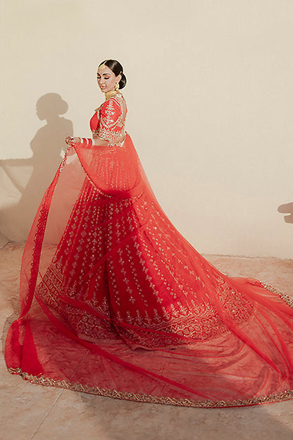 Bride: Sukhi Lidher Sidhu wearing our Red Nooraniyat Lehenga Set