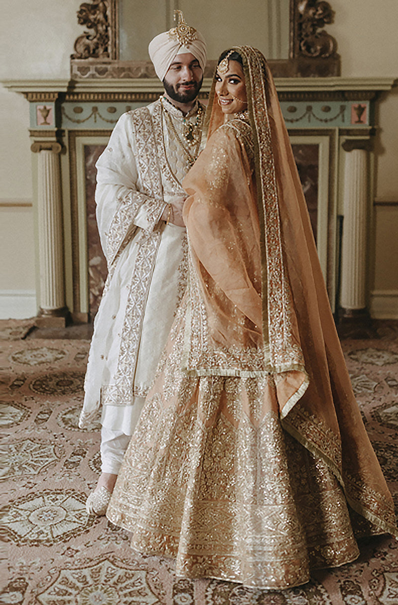 Bride: Ramneek Sodhi in Peach Gold Embroidered Lehenga Set
