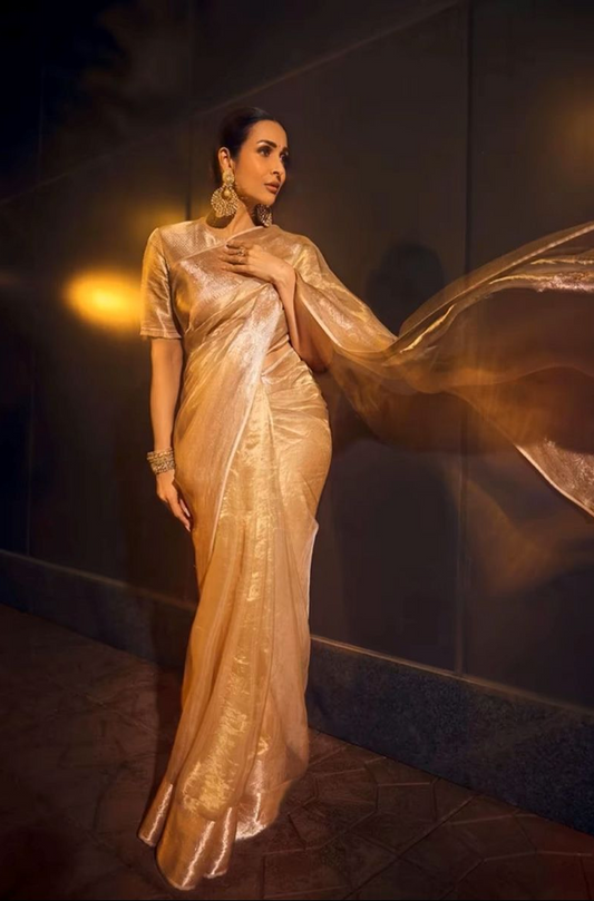 Malaika Arora in our Gold Woven Tissue Saree Set