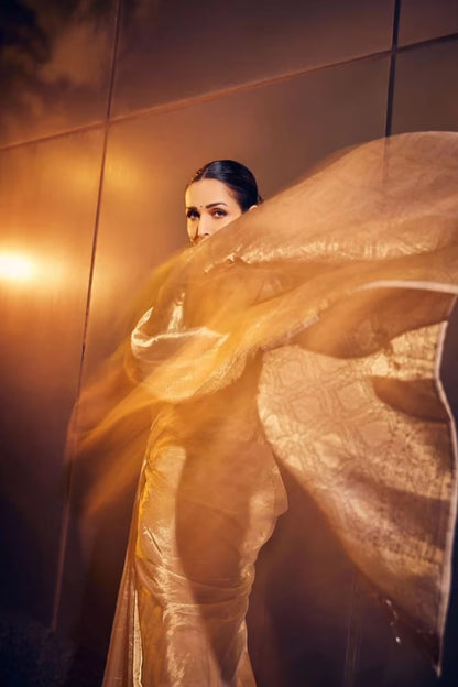 Malaika Arora in our Gold Woven Tissue Saree Set