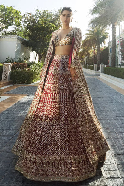 Sara Ali Khan on our Wine Raw Silk with Gold Embroidered Lehenga Set