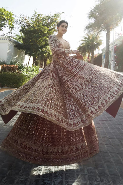 Sara Ali Khan on our Wine Raw Silk with Gold Embroidered Lehenga Set