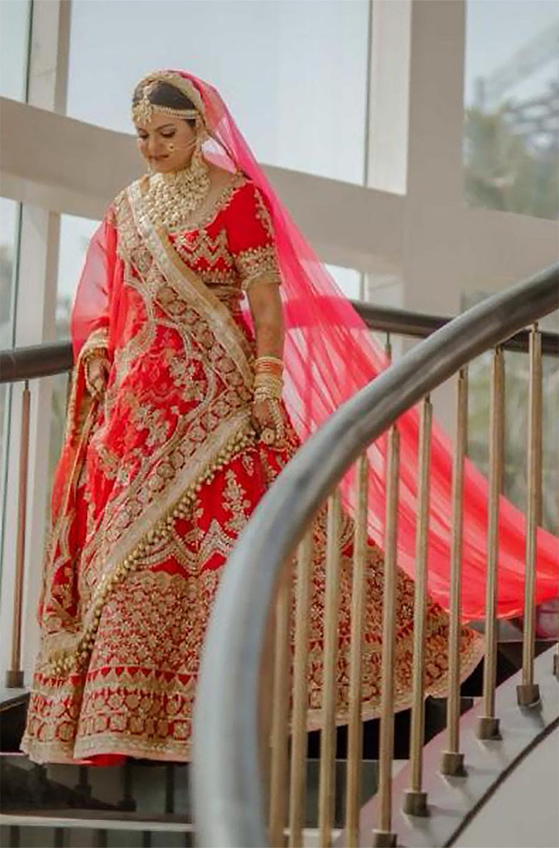 Bride: Palak in our Classic Indian Red Lehenga