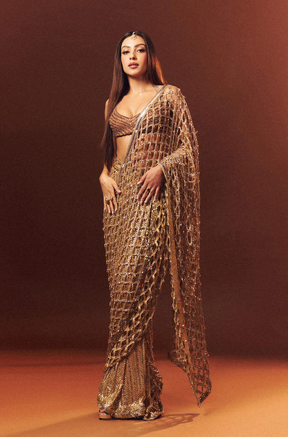 Sahher Bambba in our Gold Taban Half & Half Stitched Saree