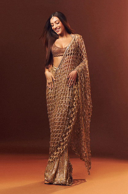 Sahher Bambba in our Gold Taban Half & Half Stitched Saree