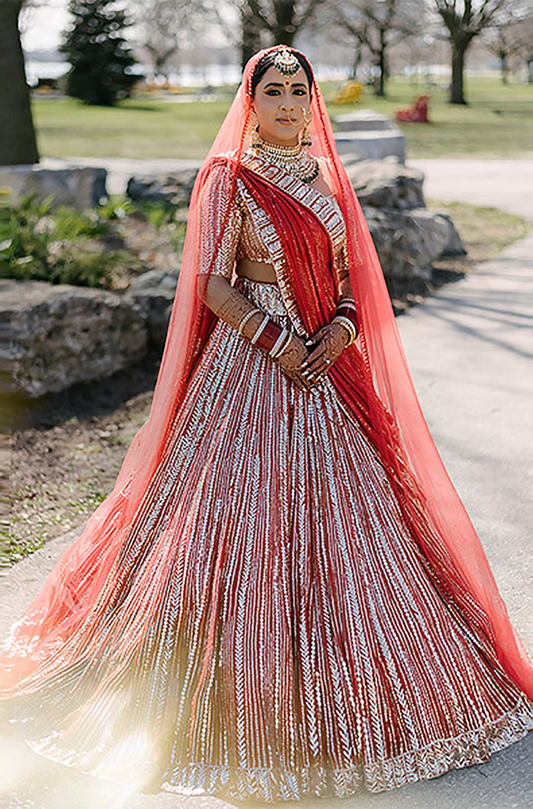 Bride: Nav Brar in Red Taban Bridal Lehenga