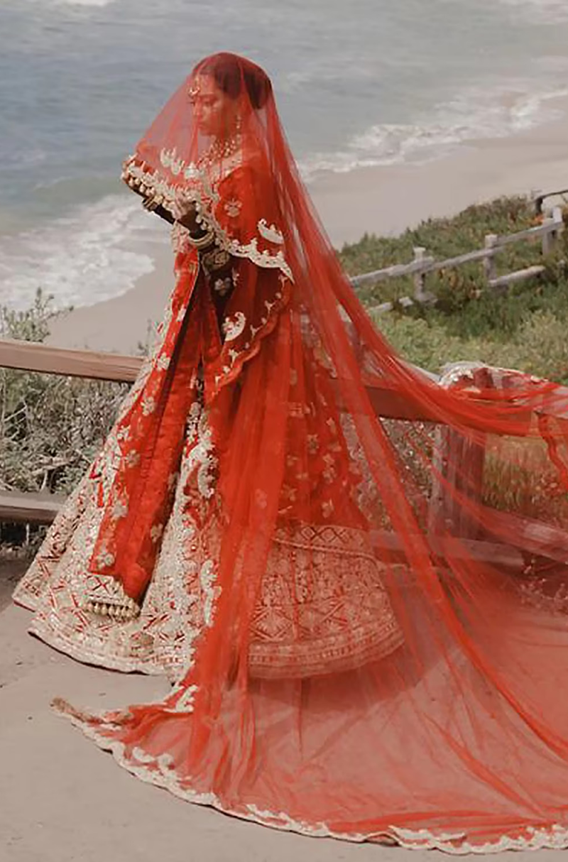 Bride: Sridevi Sheth in our Scarlet Red Nooraniyat Lehenga Set
