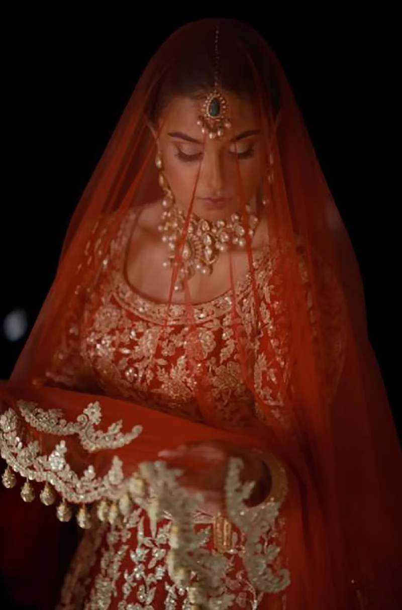 Bride: Sridevi Sheth in our Scarlet Red Nooraniyat Lehenga Set