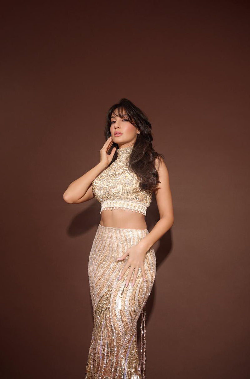 Nora Fatehi in our Champagne Hued Embroidered Skirt Set
