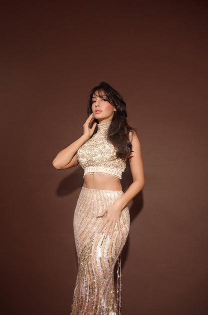 Nora Fatehi in our Champagne Hued Embroidered Skirt Set