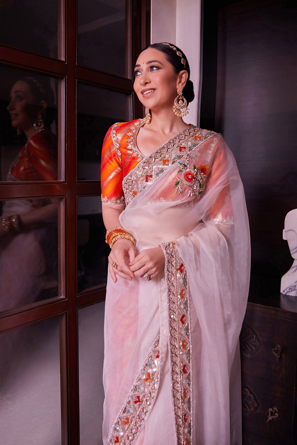 Karishma Kapoor in Ivory Saree with a Brocade Blouse