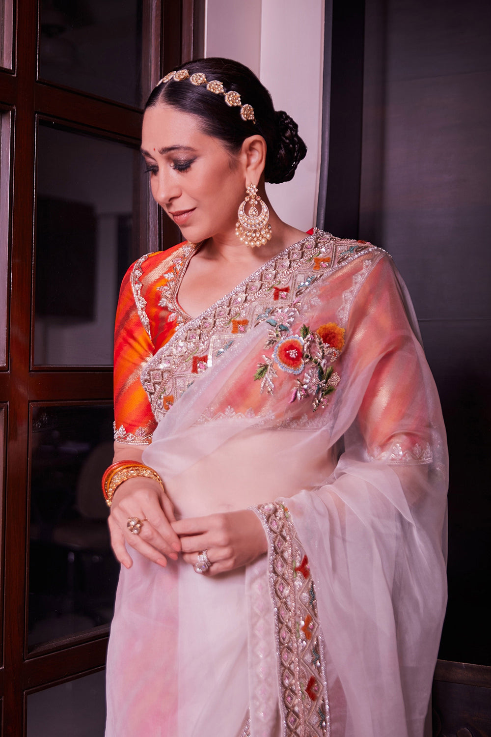 Karishma Kapoor in Ivory Saree with a Brocade Blouse