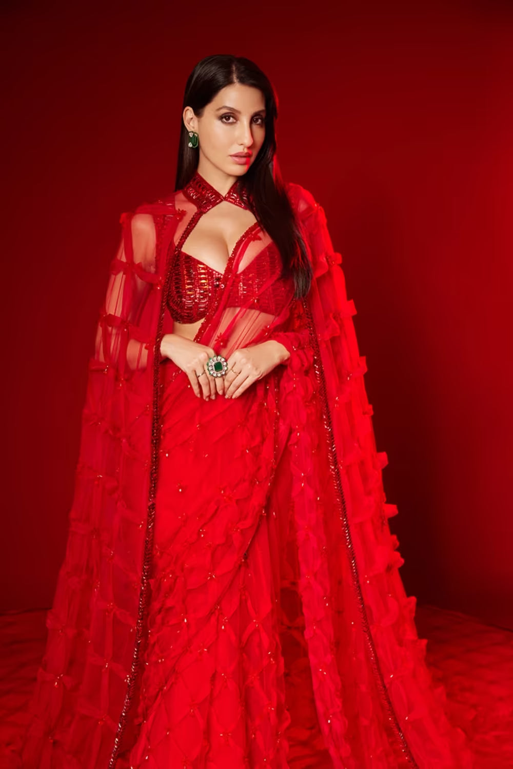 Nora Fatehi in our Red Saree and Cape Set