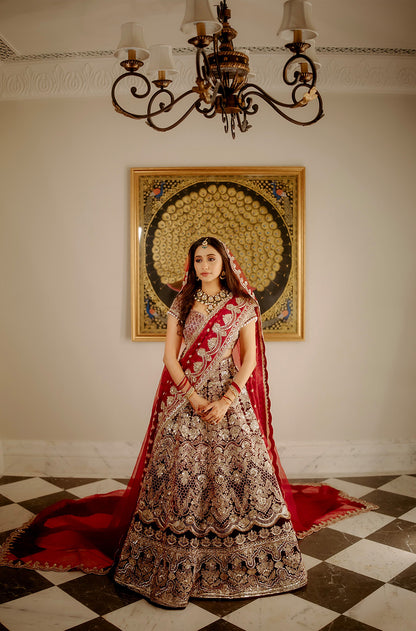 Bride: Nishi Agarwalla in our Scarlet Red Embroidered Lehenga Set