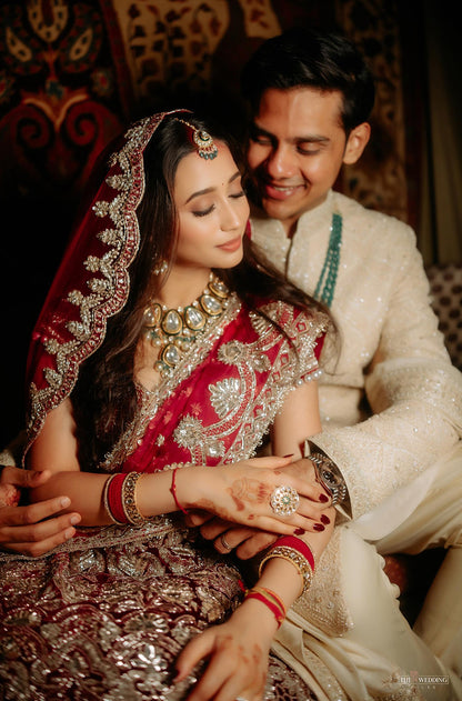 Bride: Nishi Agarwalla in our Scarlet Red Embroidered Lehenga Set