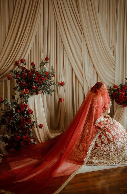 Bride: Raman Jawanda in our Scarlet Red Embroidered Lehenga Set