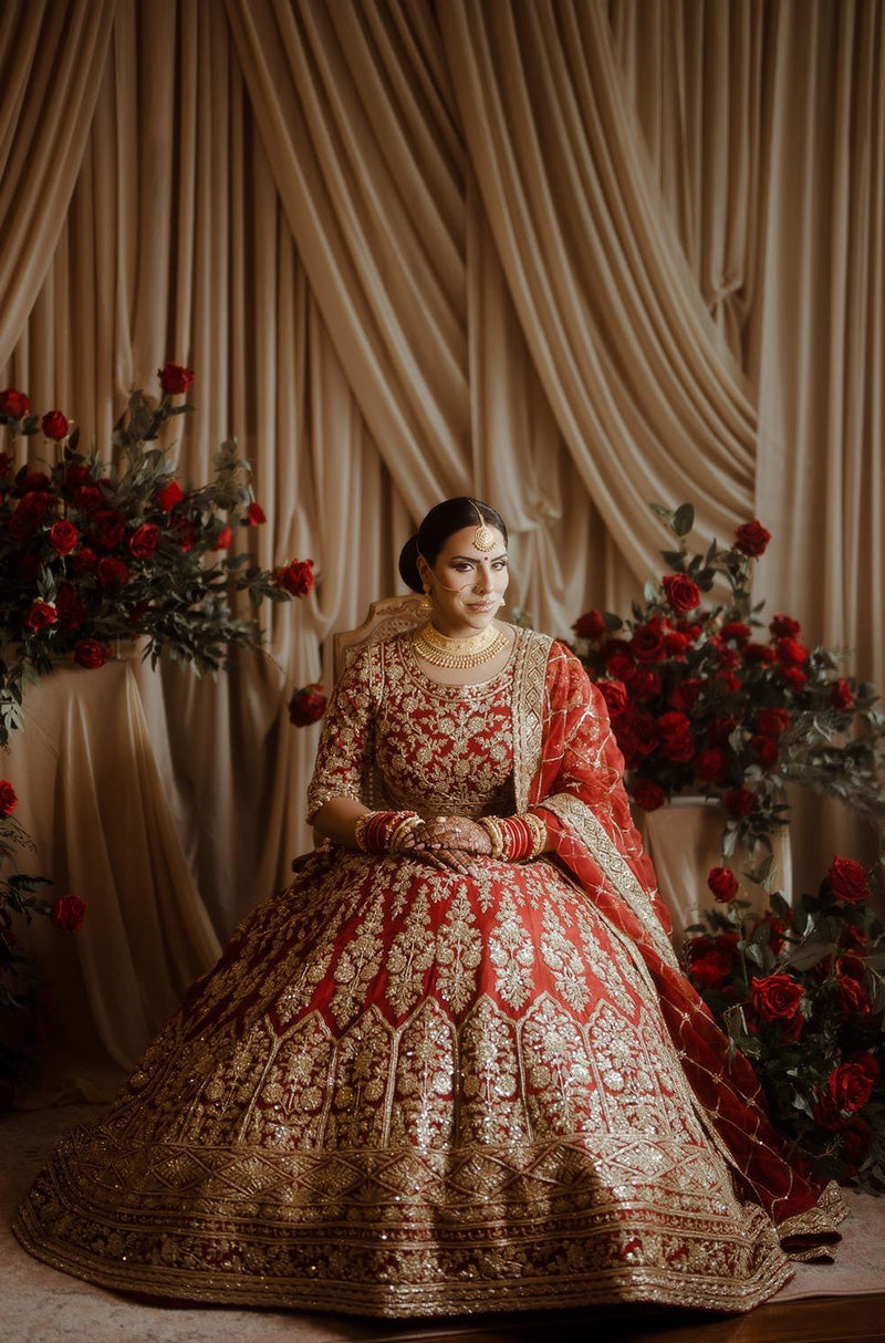 Bride: Raman Jawanda in our Scarlet Red Embroidered Lehenga Set